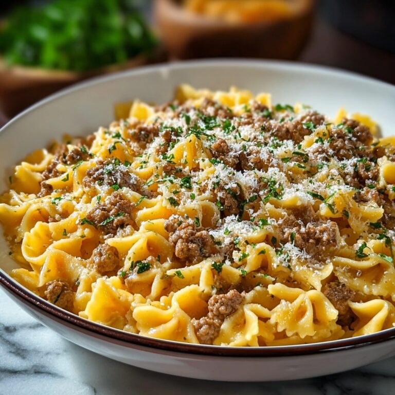 Indulgent Cajun Cream Cheese Alfredo Bowties with Spiced Beef Recipe